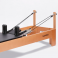 Pilates reformer curve madera